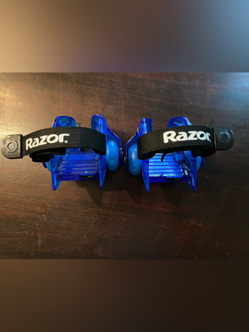 Razor Blue LED Strap-On Skate Heels with Black Razor Straps